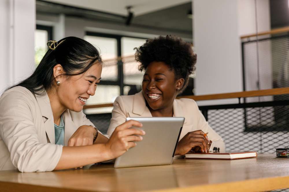 Two Women Working