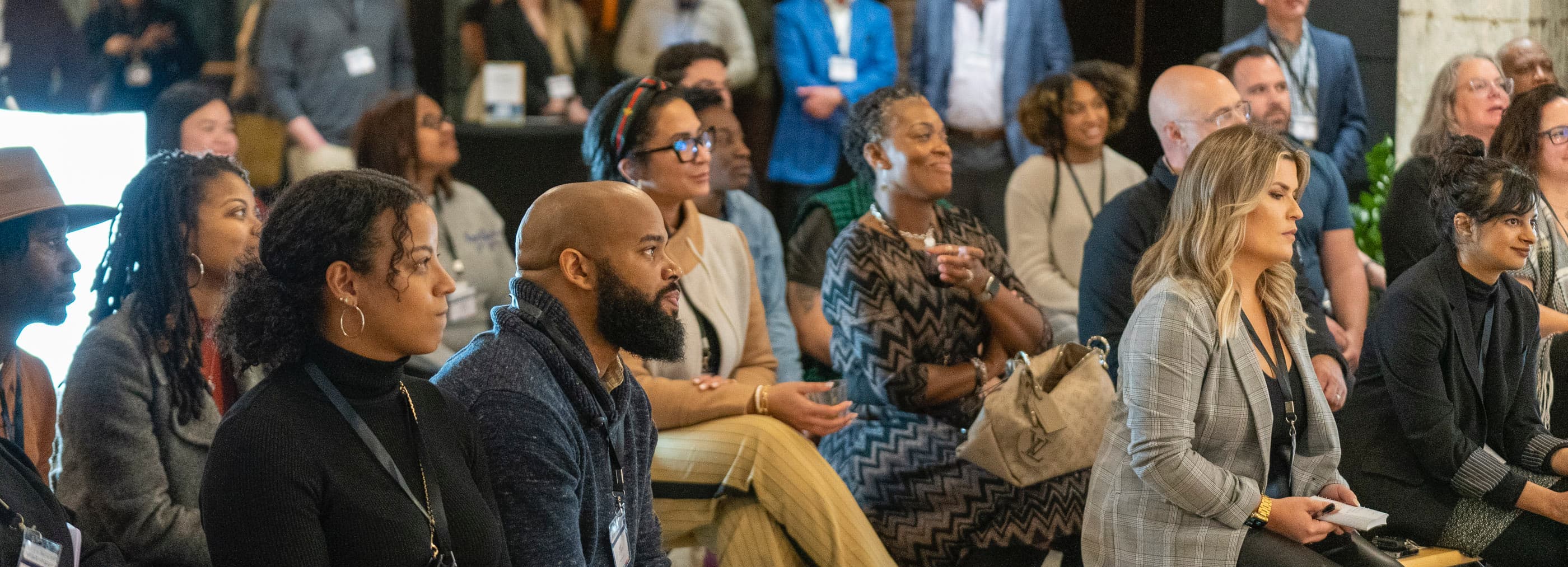 Group of people listening to speaker at DisruptHR